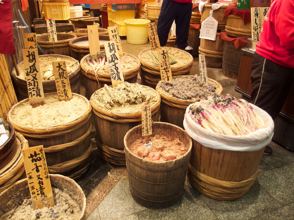 Assorted fermented foods displayed at an indoor market